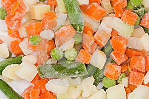 Top view of the different sliced frozen vegetables, close-up photo