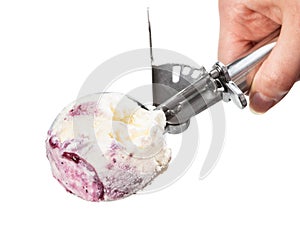 top view of disher scoop with blueberry ice cream