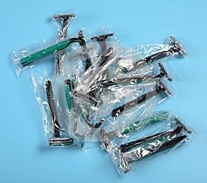 disposable shavers on a blue background