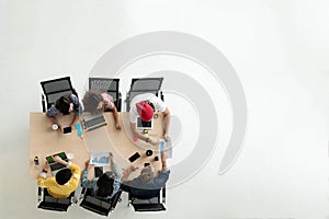 Top view of diverse people of creative team group using smartphone, mobile phone, tablet and computer laptop.