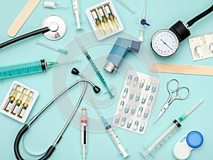 Top view of doctor`s table with stethoscope and other equipment