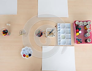 Top view of drawing and painting supplies prepared classrooms photo