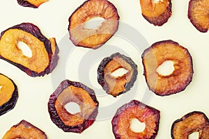 top view of dried plum slices isolated on a white background