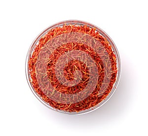 Top view of dried saffron threads in glass cup