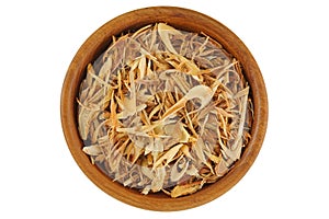 Top view of dried sliced Lemon grass to make tea, in wooden bowl