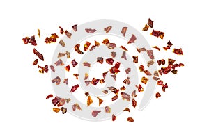 Top view of dry red chili pepper slices isolated on white background.