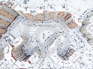 Top view at the dwelling district with snow covered inner yards and lot of parked cars. Winter season. St. Petersburg, Russia.