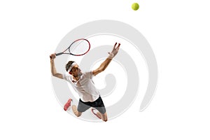 Top view. Dynamic image of sportsman, tennis player in motion, serving ball with racket, playing isolated over white