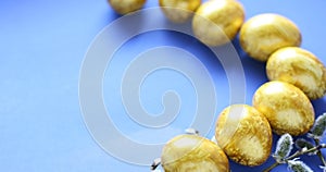 Top view easter composition with willow branch and eggs.