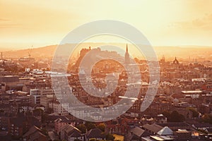 Top view of Edinburgh Castle and city in sunlight