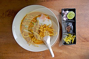 Top view Egg Noodle in Chicken Curry  Khoa Soi  is Thai food in Northern Thailand