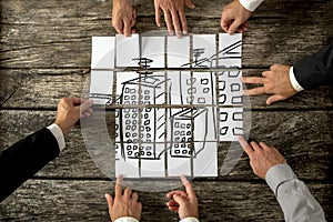 Top view of eight architects cooperating in urban development photo