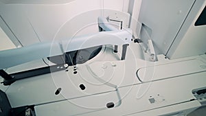 Top view of elements of a biochemical analyzer during working process