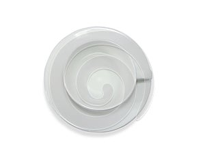 Top view of Empty coffee white cup in plate isolate on white background. White ceramic mug