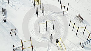 Top view of an empty sports field in a winter park. Infrastructure for winter sports