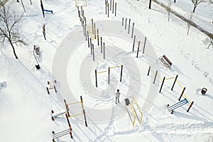 Top view of an empty sports field in a winter park. Infrastructure for winter sports