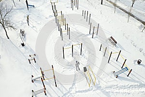 Top view of an empty sports field in a winter park. Infrastructure for winter sports