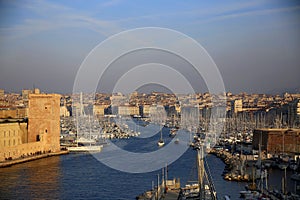 Top view of the entrance to the Vieux Port of Marseille, among the moored boats