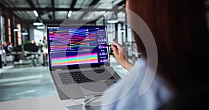 Top View Of Female Analyst Analyzing Sankey Chart