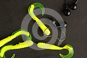 Top view of fishing lures isolated on a black background