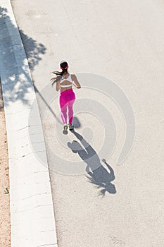 Top view of a fit woman runner