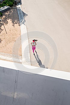 Top view of a fit woman runner