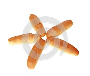 Top view of five hot dog loaves of bread placed in a flower form on a white background