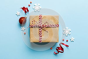 Top view Flat lay Christmas decorations and gift box on colored background with copy space. Christmas or Happy New Year