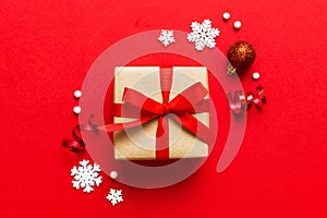 Top view Flat lay Christmas decorations and gift box on colored background with copy space. Christmas or Happy New Year