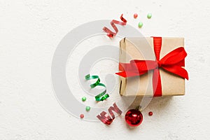 Top view Flat lay Christmas decorations and gift box on colored background with copy space. Christmas or Happy New Year