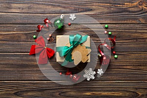 Top view Flat lay Christmas decorations and gift box on colored background with copy space. Christmas or Happy New Year