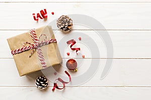 Top view Flat lay Christmas decorations and gift box on colored background with copy space. Christmas or Happy New Year