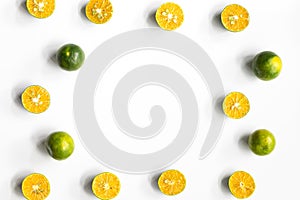 Top view, flat lay of fresh mandarin oranges on white background with copy space