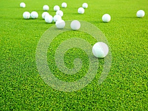 top view flat lay of golf balls on grass background, the concept of a sport for the rich, luxury, fitness, game