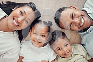 Top view, floor and portrait of black family in home with happiness, love and smile on faces. Holiday, children and