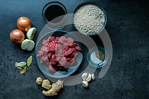 Top view of food ingredients, with meat, ingredients and beef on dark floor, Indonesian ingredients. Preparation of food