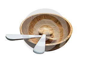 Top view fork and spoon on wooden bowl