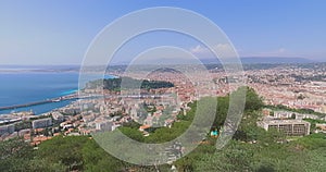 top view of the French Riviera in clear sunny weather, view from Mont Boron Park, Nice port promenade, rooftops and