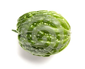 Top view fresh green bitter melon on white background