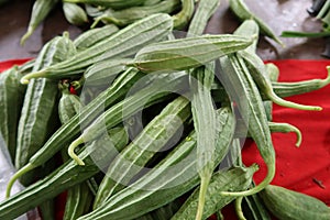 Top view of fresh green zucchini organic vegetables for sale in Asian fruit and vegetable market