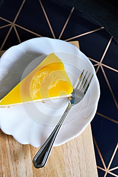 Top view of Fresh Lemon Cheese Tart on White Dish