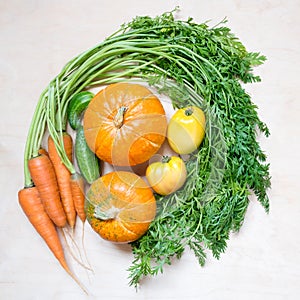 Top view fresh organic vegetables on wooden background. flat lay