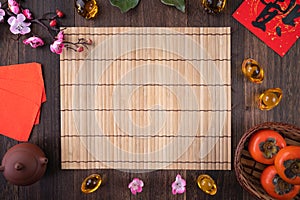 Top view of fresh persimmons on wooden table background for Chinese lunar new year