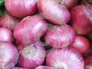 Top view of fresh red onion as a background for sale