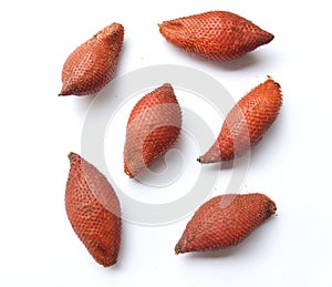 Top view Fresh ripe delicious Salak or Salacca zalacca fruits isolated on white background.summer fruit of thailand