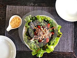 Top view of Fresh salad with tuna on white plate , Healthy food.