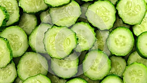 Top view of fresh sliced cucumber rotation. Close up.