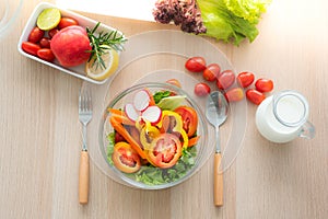 Top view of fresh vegetable salad bowl, mixed vegetables