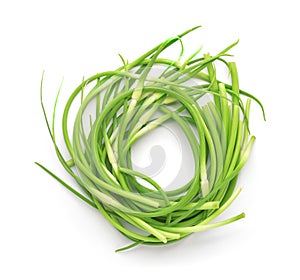 Top view of fresh young garlic scapes