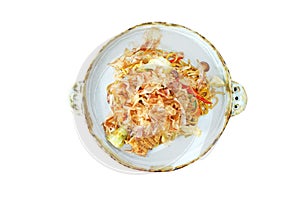 Top view fried yaki soba noodles with pork on plate isolated on white background